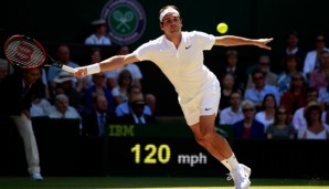 LONDON, ENGLAND - JULY 06: Roger Federer of Switzerland plays a forehand during the Men's Singles Quarter Finals match against Marin Cilic of Croatia on day nine of the Wimbledon Lawn Tennis Championships at the All England Lawn Tennis and Croquet C...