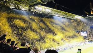 ... doch es kommt wie immer auf die Perspektive an: Mit einem gewaltigen schwarz-gelben BVB-Schriftzug starteten die Dortmund-Fans in die neue CL-Saison.