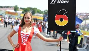 Man merkt, Österreich und Ungarn haben geschichtlich einen gemeinsamen Hintergrund (Stichwort: k. u. k.), im Rennen in Budapest trug Nico Rosbergs Dame nämlich ein Dirndl-ähnliches Outfit.