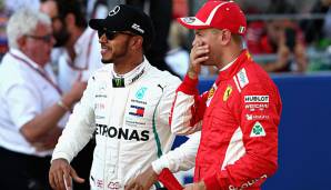 Lewis Hamilton und Sebastian Vettel fahren um die Formel-1-Weltmeisterschaft.