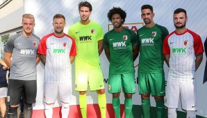 Der FC Augsburg bleibt sich recht treu: Das Heimtrikot vereint mit Rot, Weiß und Grün alle Vereinsfarben. Auswärtsfahrten werden von nun an in Grün angetreten