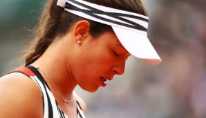 PARIS, FRANCE - MAY 24: Ana Ivanovic of Serbia reacts during the Women's Singles first round match against Oceane Dodin of France on day three of the 2016 French Open at Roland Garros on May 24, 2016 in Paris, France. (Photo by Clive Brunskill/Gett...
