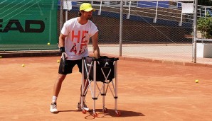 Juan Carlos Ferrero als Ballmaschine