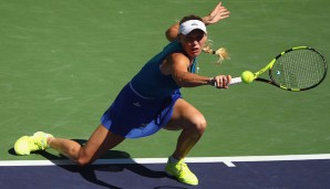 Sieht ein wenig nach Kung-Fu-Tennis aus, das Caroline Wozniacki da macht.