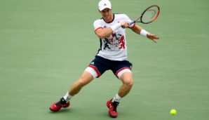 RIO DE JANEIRO, BRAZIL - AUGUST 07: Andy Murray of Great Britain plays a forehand against Viktor Troicki of Serbia in their first round match on Day 2 of the Rio 2016 Olympic Games at the Olympic Tennis Centre on August 7, 2016 in Rio de Janeiro, Br...