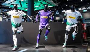 Borussia Mönchengladbach - Heimtrikot: Die Fohlen kommen daheim in Weiß daher. Ausgefallen sind dagegen die transparenten Rauch-Elemente in Schwarz und Grün, die die Energie der Fans transportieren sollen.