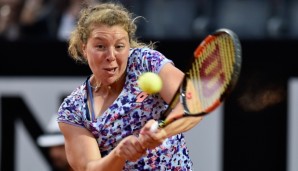 ROME, ITALY - MAY 10: Anna-Lena Friedsam of Germany plays a backhand in her match against Serena Williams of the United States on Day Three of The Internazionali BNL d'Italia 2016 on May 10, 2016 in Rome, Italy. (Photo by Dennis Grombkowski/Getty I...