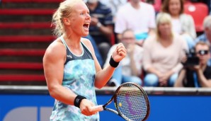 NUREMBERG, GERMANY - MAY 20: Kiki Bertens of Netherlands celebrates after defeating Julia Goerges during day seven of the Nuernberger Versicherungscup 2016 on May 20, 2016 in Nuremberg, Germany. (Photo by Alex Grimm/Bongarts/Getty Images)