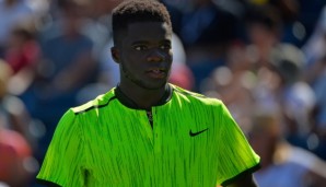 NEW YORK, NY - AUGUST 29: Frances Tiafoe of the United States reacts during his first round Men's Singles match against John Isner of the United States on Day One of the 2016 US Open at the USTA Billie Jean King National Tennis Center on August 29, ...