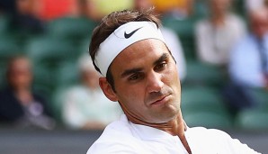 Roger Federer beim lockeren Einschalgen mit Alexandr Dolgopolov